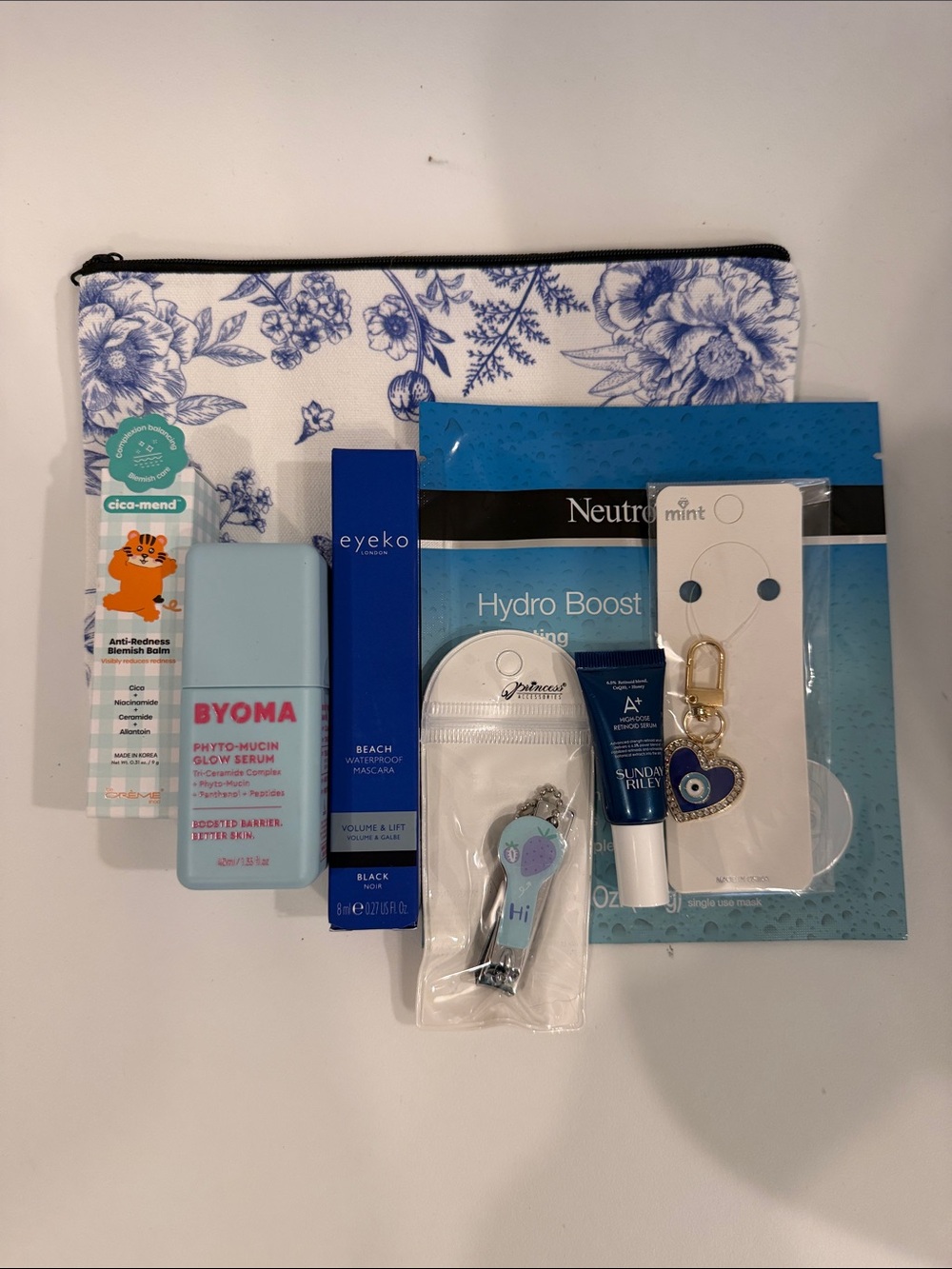 Gift Set with Blue Floral Pouch - 7 items including total The Crème Shop & Byoma